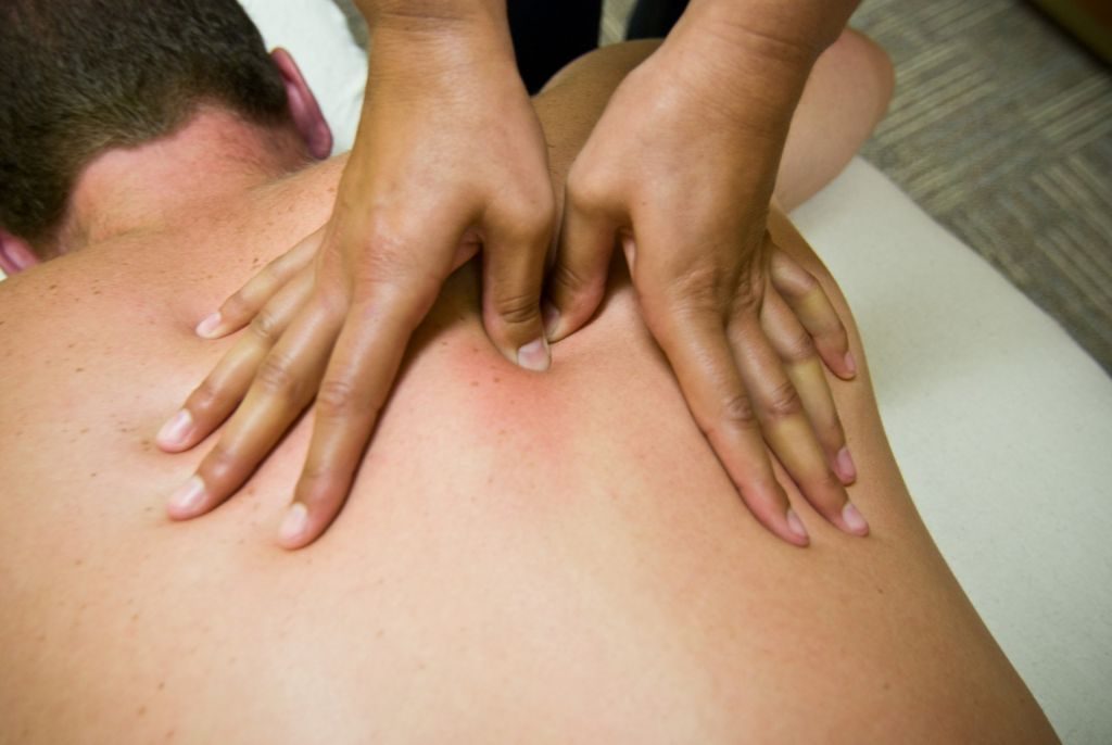 undergo massage therapy